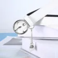 White women belt with round metal buckle and chic pearl pendant, versatile fashion accessory. - Pearl Pendant / White