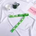 Green canvas belt featuring cute white daisy floral print and stylish double ring metal buckle. - 120cm / Green