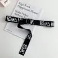 Men casual canvas belt with double D-rings and trendy letter print, versatile summer accessory. - Black