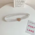 Elegant multi-strand faux pearl waist belt with sparkling rhinestone flower buckle for dresses. - Style 1