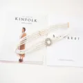 Elegant multi-strand pearl waist belt with sparkling rhinestone buckle in white variant. - Style 4