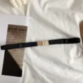 Cintura elástica negra con hebilla metálica dorada, elegante accesorio para cintura. - Negro