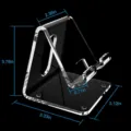 Detailed view of the transparent and black acrylic phone stand showing precise dimension measurements. - Clear
