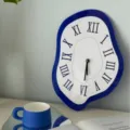 Nordic creative melting wall clock variant, unique Roman numeral design for bedroom decor. - Blue & White