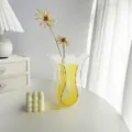 Transparent acrylic wavy vase with yellow insert, modern table decor variant for home display. - Wavy Transparent Yellow