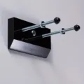 Black acrylic wall-mounted skateboard display bracket with durable metal screws and bolts for home use. - Black