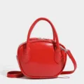 Borsa da bowling rossa in pelle da donna, elegante borsetta con tracolla e manici. - Rosso