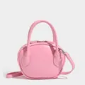 Borsa a mano a cupola rosa minimalista per donna, elegante borsa a tracolla bowling PU. - Rosa