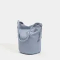 Borsa a secchiello in vera pelle morbida azzurro chiaro, borsa a spalla casual da donna. - Blu