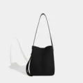 Black minimalist shoulder bag, classic black design, versatile daily style, premium handbag. - Black