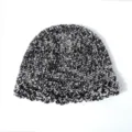 Detalle gorro tejido a crochet negro blanco textura estilo accesorio invierno - Ajustable / Negro Mezcla Blanco