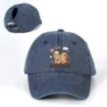 Detailed view of dark blue denim ponytail baseball cap with cute capybara print and buckle. - Adjustable / Navy Blue