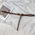 Elegant brown leather thin belt for women dress decoration with stylish metal buckle design. - Brown
