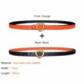 Reversible women's thin leather belt with gold heart buckle in orange and black color. - Black + Orange
