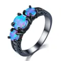 Meravigliosa anello tre pietre in opale blu placcato oro nero da donna, elegante gioiello moda. - Taglia 6 / Oro Nero Opale Blu