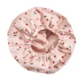 Detailed view of the pink cherry print waterproof shower cap with a soft inner lining. - Pink Cherry Print