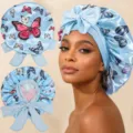 Gorro de dormir de satén con estampado de mariposas y lazos ajustables para el cabello. - Talla única / Azul claro