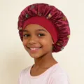 Kids satin sleep bonnet with wide elastic band and cute butterfly print for hair care protection. - Burgundy