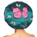 Close-up detail of the colorful butterfly print satin hair bonnet, showing soft green fabric texture. - One Size / Aqua Blue