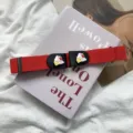 Red elastic waist belt with cute cartoon rabbit decoration, stylish and punch-free design. - Wealth Rabbit