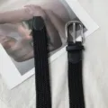 Black braided elastic belt with silver pin buckle, minimalist style for daily wear. - Black Silver Clasp