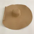 Detail view of a large brim straw sun hat in khaki, perfect for summer beach and UV protection. - 25cm Brim (Head Circumference 56-58cm) / Khaki Rolled Brim