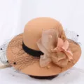 Detail view of elegant camel women woolen bucket hat with black ribbon mesh and floral decor. - M (56-58cm) / Mesh Floral Khaki