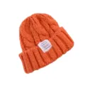 Bonnet d'hiver tricoté en grosses mailles torsadées pour femme, bonnet chaud et douillet. - Orange