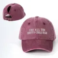 Detail view of the washed maroon ponytail baseball cap featuring white embroidered text. - Adjustable / Burgundy