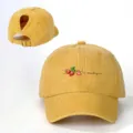 Yellow washed cotton ponytail baseball cap with cute strawberry print detail and adjustable strap. - Adjustable / Yellow