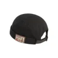 Detailed view of black retro docker cap with stylish outdoor patch, adjustable strap, cool look. - M (56-58cm) / Black