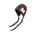 Brown knitted earflap hat with braided tassels and decorative patch for cozy winter wear. - Coffee