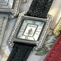 Women vintage rectangular quartz watch with rhinestone bezel and black leather strap elegant - Silver Case White Dial Black Strap