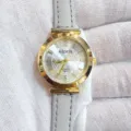 Montre quartz femme minimaliste Kloris avec bracelet cuir gris, boîtier rond doré. - Boîtier Or Cadran Blanc Bracelet Gris