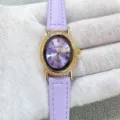 Purple leather strap quartz watch with oval rhinestone bezel and classic Roman numerals. - Gold Case Purple Dial Purple Leather Strap