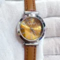 Detailed close-up view of the elegant women quartz watch showcasing its refined dial and strap. - Silver Case Brown Dial Brown Strap