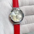 Women's quartz wristwatch with round silver dial, clear arabic numerals and red leather strap. - Silver Case White Dial Red Strap