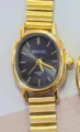 Elegant vintage gold tone small oval dial quartz watch with stylish chain strap for women. - Gold Black Dial