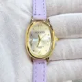 Kloris Damen Armbanduhr Detail, ovale Quarz-Uhr, helllila Lederarmband, Goldgehäuse. - Goldenes Gehäuse Weißes Zifferblatt Violettes Armband