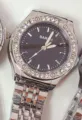 Elegant silver quartz women's watch featuring a sparkling rhinestone bezel and durable metal strap - Silver Case Black Face
