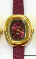 MICAI vintage ovale Damenuhr mit Quarzwerk, stilvoller goldener Lünette und Lederarmband. - Goldenes Gehäuse Rotes Zifferblatt Rotes Armband