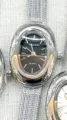 KOUSHI women's oval quartz watch with silver mesh strap and dark dial elegant timepiece - Silver Case Black Dial