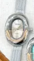 Silver oval quartz watch for women with mesh strap and stylish bathtub case design. - Silver Case Grey Dial