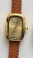 MICAI rectangular quartz watch with brown leather strap and classic Roman numerals dial. - Gold Case Gold Dial Light Brown Strap