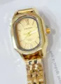KOUSHI gold quartz watch for women with small rectangular dial and metal strap elegance. - Gold Gold Dial