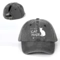 Detail shot of distressed washed cotton baseball cap with ponytail hole and funny cat print. - Adjustable / Black