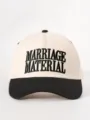 Close-up detail view of the custom embroidered lettering on the front panel of the fashion cap. - Adjustable / Beige and Black