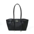 Detail view of a black leather shoulder tote bag with elegant handles and metal hardware. - Black