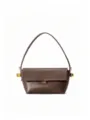 Chic brown leather shoulder bag with unique gold hardware, elegant underarm bag for women. - Coffee