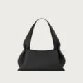 Black leather shoulder bag featuring unique knotted handles and textured finish for everyday use - Black